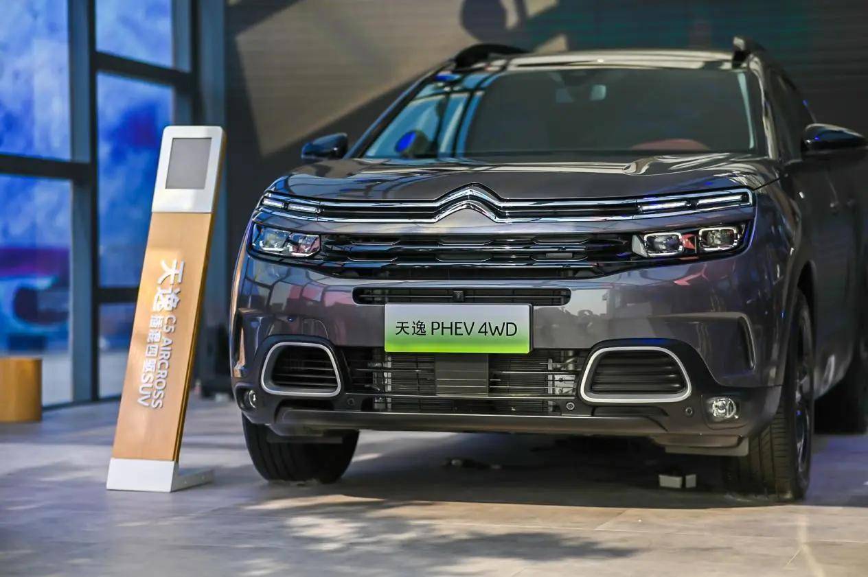 法系品牌是前驱家用车的鼻祖?三电机混动天逸究竟实力如何_搜狐汽车_