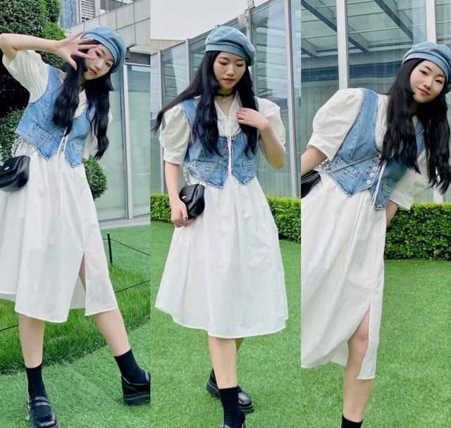 搭配和马甲同色的牛仔帽和黑色的包包,皮鞋,一身穿搭色彩和谐,整体