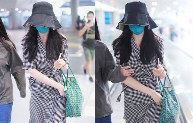 迪丽热巴真惊艳,穿斜边裙用手扯也难掩"莲藕腿",白