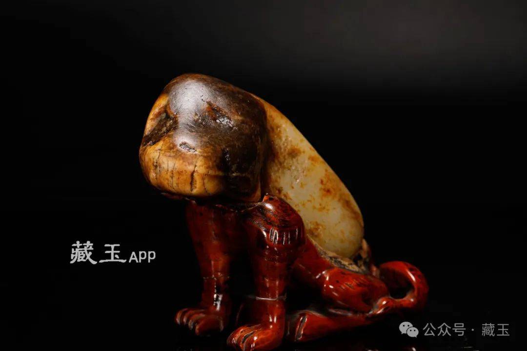 今天要说的狗头象形籽不是它,而是另一个 形状酷似"旺财"的和田玉籽料