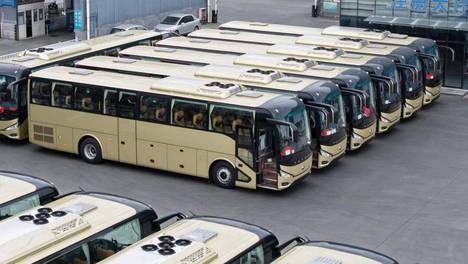 宇通向陕西迎宾交付60辆C12客车 车辆将全部投入高端通勤业务