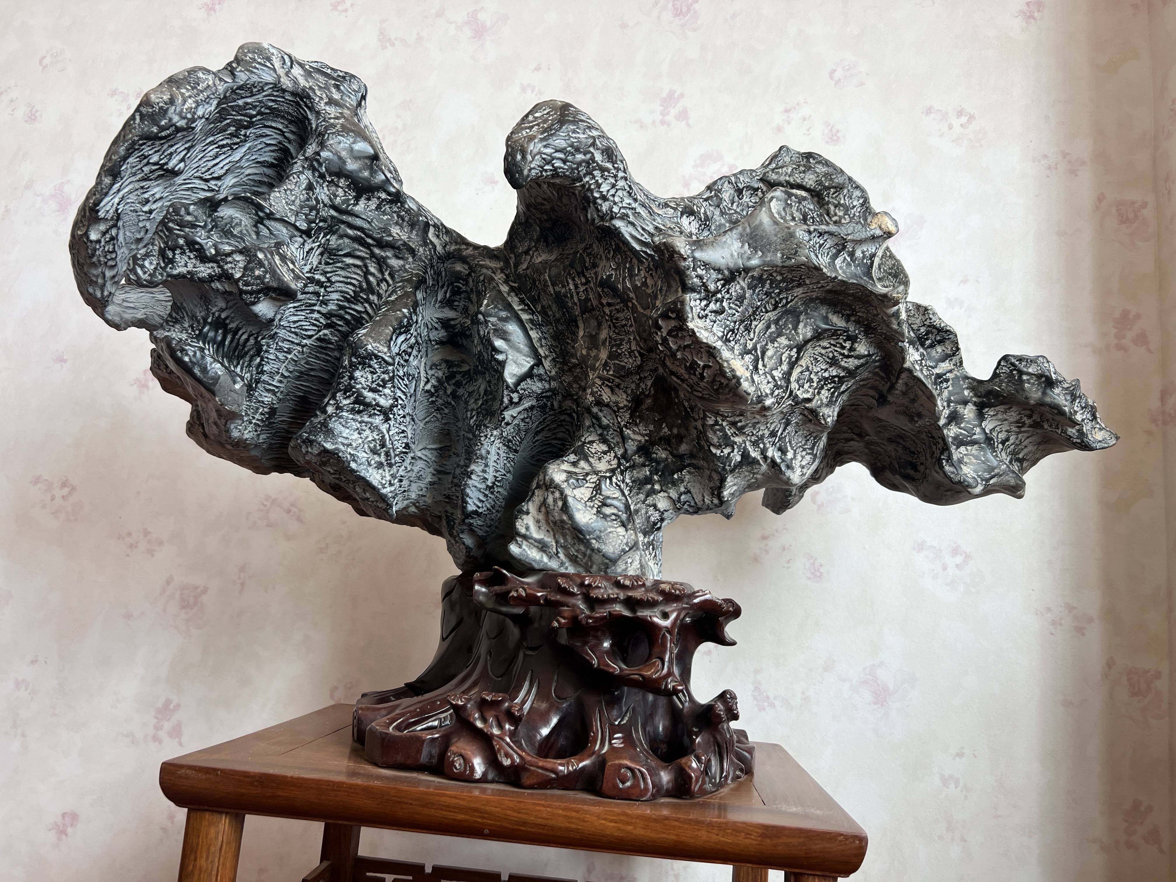 文化"则指磬云山所产之奇形怪状,特具美学价值的孤块纯天然观赏石而言