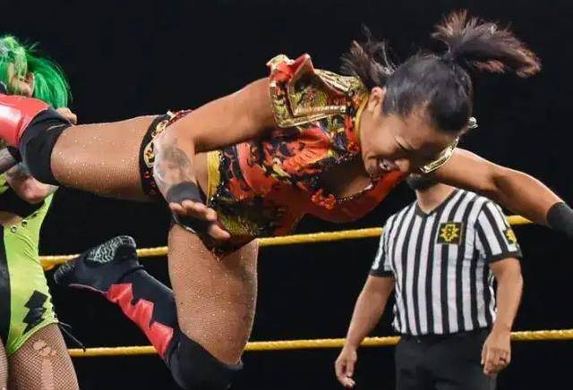 原创首位中国女将李霞身材健硕大腿纹身成标志获名宿认可