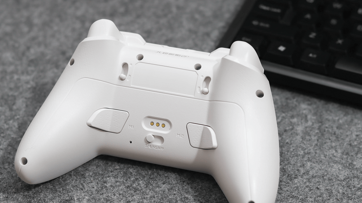 同价位唯一双切震动扳机！北通鲲鹏20绝尘白用自研技术打造入门手柄天花板