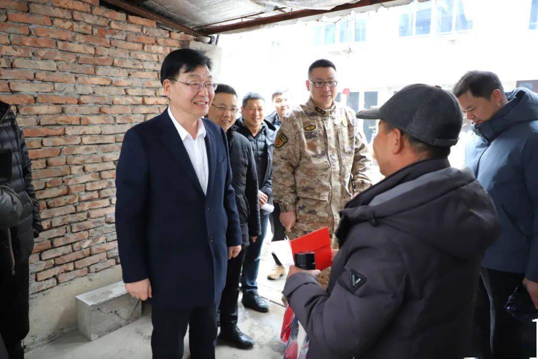 张建新开展春节走访慰问活动_发展_老干部_人才