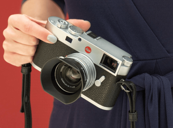 镜头正面刻有「leitz wetzlar」字样,彰显其独特的身份与品质.