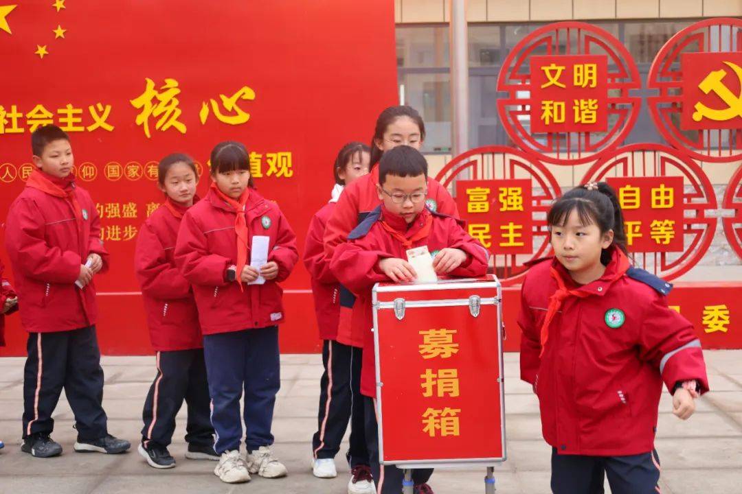 三月春风处处暖雷锋精神代代传记定边县东关小学学雷锋月系列活动