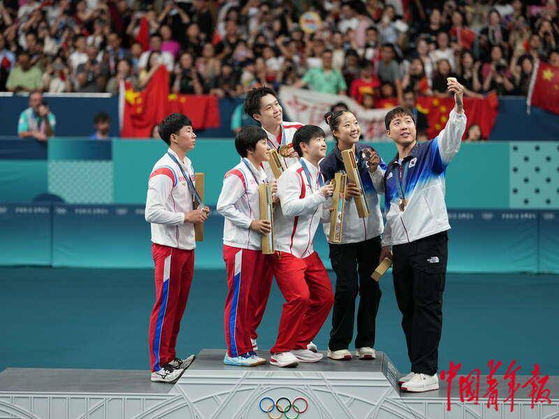 "莎头组合"力克"黑马" 夺得乒乓球混双金牌
