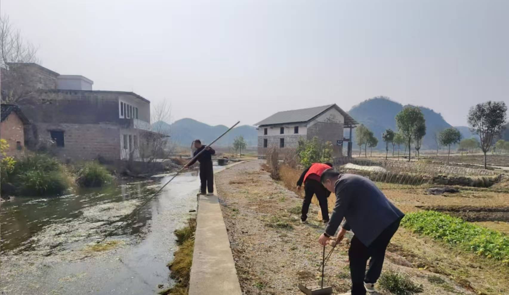新田县石羊镇:团结干群护河道 淘洗碧波迎新春